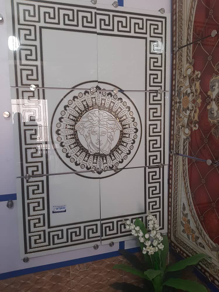 Center decorations tiles for sale at STI market Coker Orile