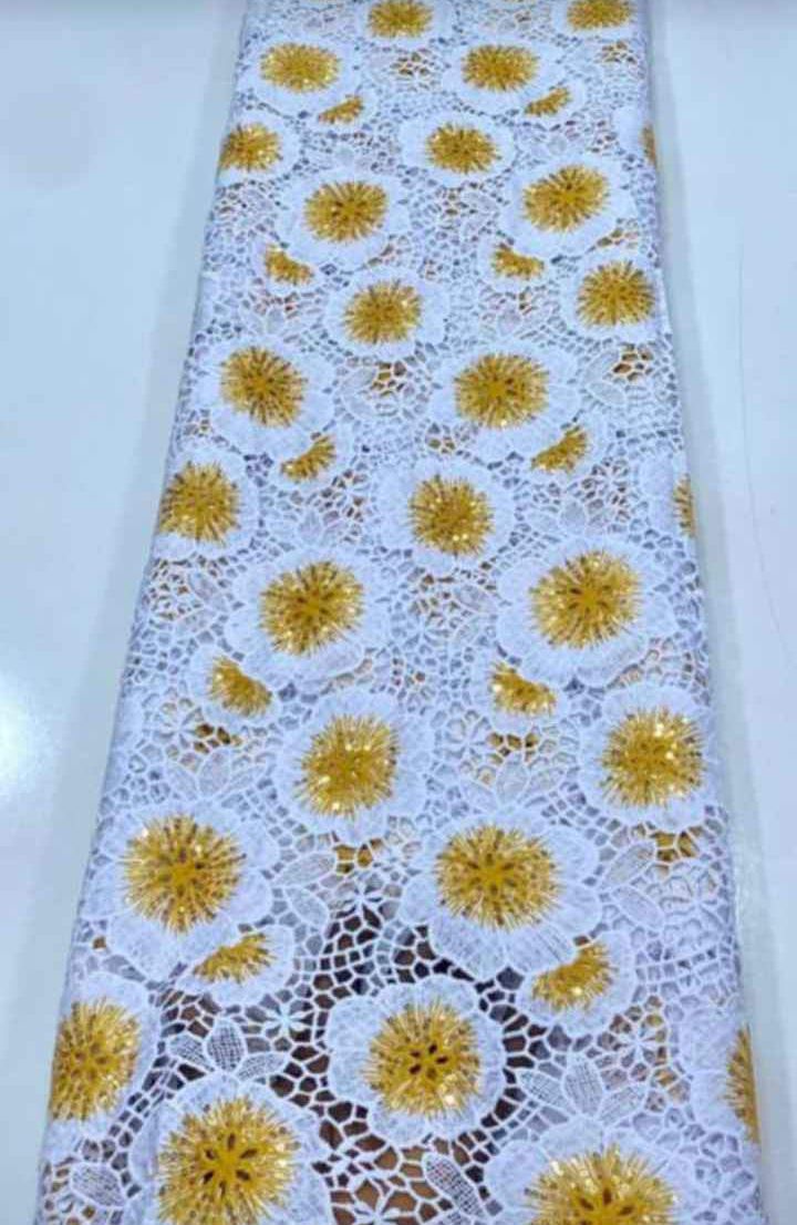 Cord lace material for sale at Agege