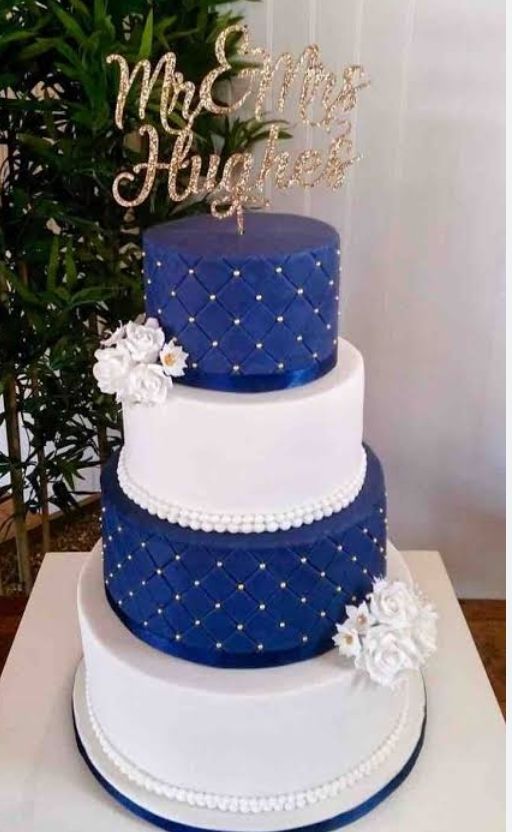 Blue and white fundant wedding cake for sale at ikorodu