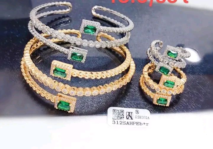 Classic gold and silver bangles for sale at Oshodi